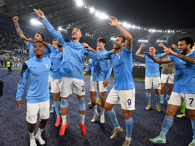 Lazio's Pedro celebrates with teammates after the match on October 27, 2022