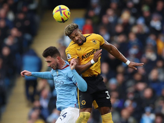 Manchester City's Aymeric Laporte in action with Wolverhampton Wanderers' Adama Traore on January 22, 2023