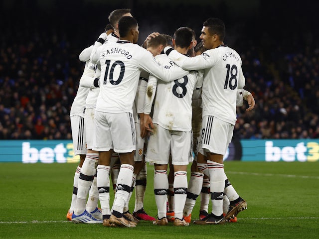 Manchester United players celebrate Bruno Fernandes's goal against Crystal Palace on January 18, 2023