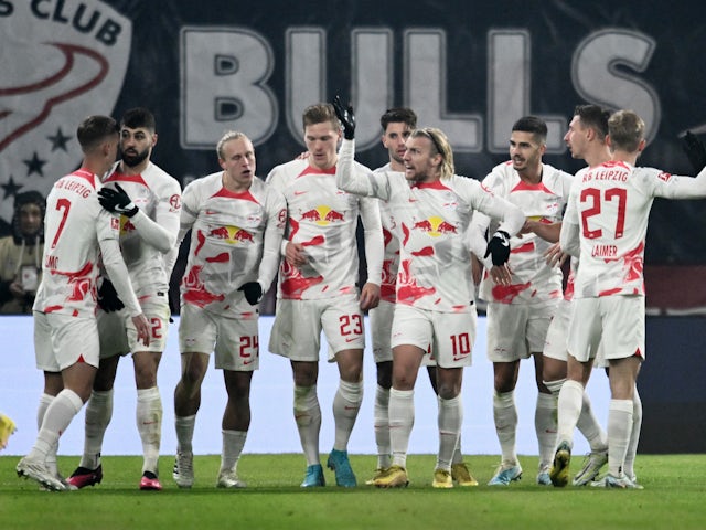RB Leipzig's Marcel Halstenberg celebrates scoring their first goal with teammates on January 20, 2023