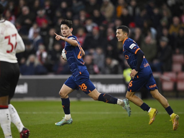 Blackpool's Charlie Patino celebrates scoring their first goal with Ian Poveda on January 28, 2023