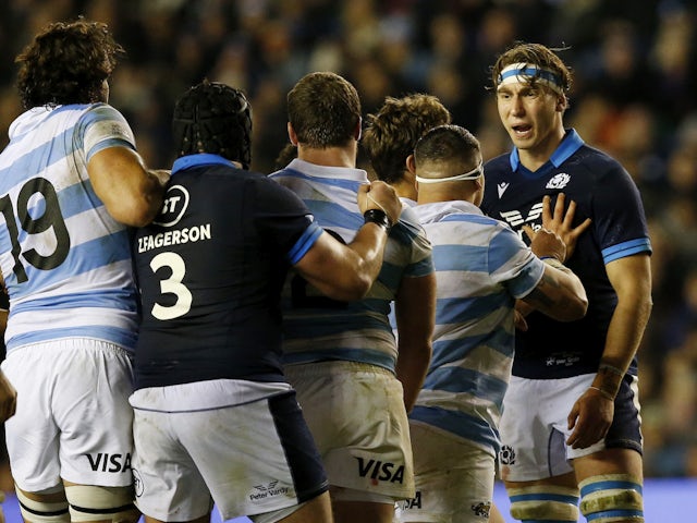 Scotland's Jamie Ritchie clashes with Argentina players on November 19, 2022