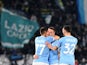 Lazio's Sergej Milinkovic-Savic celebrates scoring their first goal with Adam Marusic and Danilo Cataldi on January 24, 2023