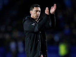 Fleetwood Town manager Scott Brown applauds the fans after the match on January 28, 2023