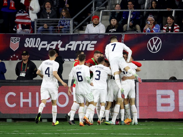 Serbia midfielder Veljko Simic (10) celebrates with midfielder Luka Ilic (7) after scoring a goal during the second half against the USA at BMO Stadium on January 25, 2023