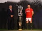 Wales' Ken Owens and head coach Warren Gatland pose with the Six Nations trophy during the launch on January 23, 2023