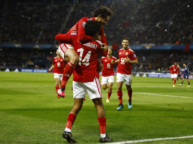 Al Ahly's Hussein El-Shahat celebrates scoring their first goal with Mohamed Hany on February 1, 2023