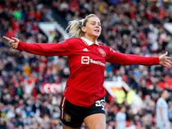 Alessia Russo celebrates scoring for Manchester United Women in December 2022