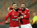 Al Ahly's Amr El Solia celebrates scoring their first goal with Ali Maaloul on January 2, 2023