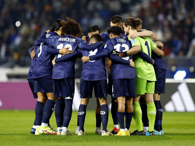 Auckland City players huddle before the match on February 1, 2023