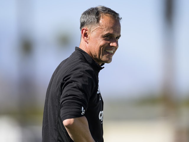Charlotte FC head coach Christian Lattanzio watches the game from the sidelines against Vancouver Whitecaps FC at Empire Polo Club on February 4, 2023