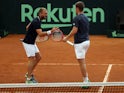 Dan Evans and Neal Skupski in action at the Davis Cup qualifiers on February 4, 2023