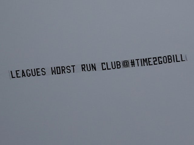 A plane flies over the stadium displaying a message in protest against the Everton owner and board on February 4, 2023