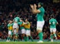 Ireland players celebrate after Ireland 's James Lowe scores a try on February 4, 2023