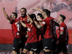 Mallorca players celebrate scoring against Real Madrid on February 5, 2023