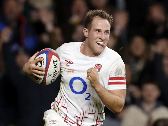 England's Max Malins celebrates scoring their second try on February 4, 2023