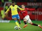 Manchester United's Antony in action with Nottingham Forest's Emmanuel Dennis on February 1, 2023