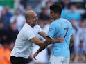 Manchester City manager Pep Guardiola pictured with Joao Cancelo on August 21, 2022