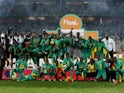 Senegal players celebrate with the trophy after winning the African Nations Championship on February 4, 2023
