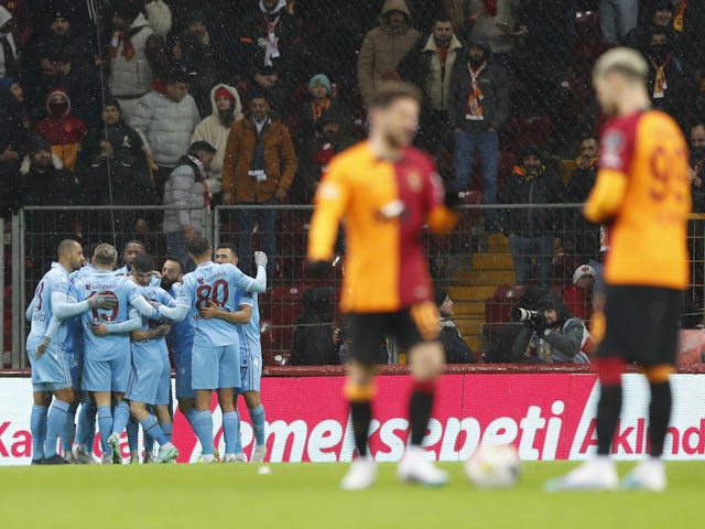 Trabzonspor's Maxi Gomez celebrates scoring their first goal with teammates on February 5, 2023