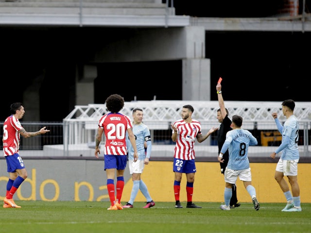 Atletico Madrid's Stefan Savic is shown a red card by referee Jorge Figueroa Vazquez on February 12, 2023