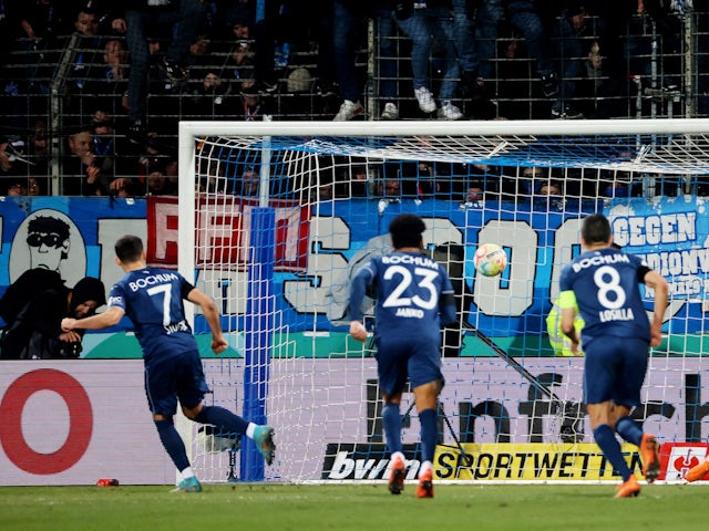 VfL Bochum's Kevin Stoger scores their first goal from the penalty spot on February 8, 2023