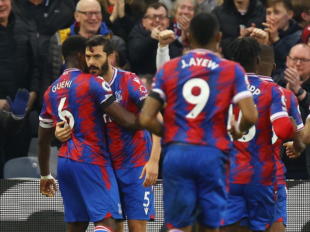 Crystal Palace's James Tomkins celebrates scoring their first goal with Marc Guehi on February 11, 2023