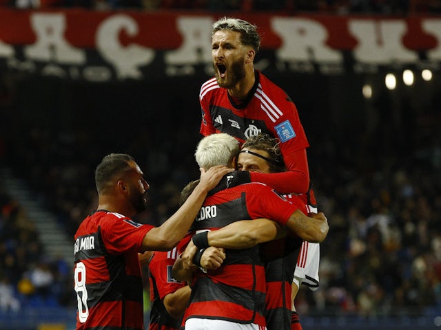 Flamengo's Pedro celebrates scoring their first goal with teammates on February 7, 2023