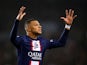 Paris Saint-Germain's Kylian Mbappe reacts after missing a chance to score on December 28, 2022
