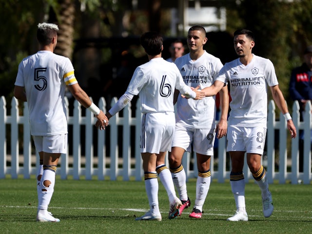 Los Angeles Galaxy midfielder Marco Delgado (8) celebrates with teammates after scoring a goal during the first half of the Coachella Valley Invitational MLS Pre-Season game against the St. Louis CITY SC at Empire Polo Club on February 8, 2023
