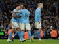 Manchester City's Ilkay Gundogan celebrates scoring their second goal with Manchester City's Ruben Dias, Aymeric Laporte and Erling Braut Haaland on February 12, 2023