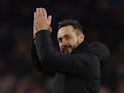 Brighton & Hove Albion manager Roberto De Zerbi applauds fans after the match on February 11, 2023
