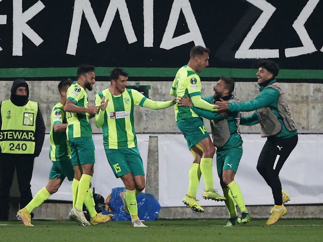 AEK Larnaca's Angel celebrates scoring their first goal with teammates on February 16, 2023