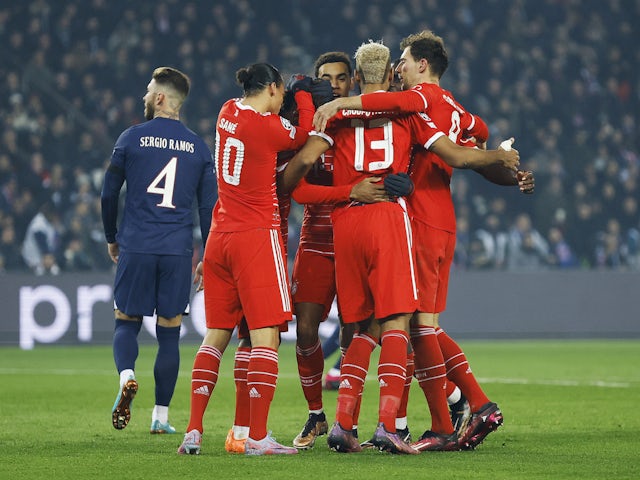 Bayern Munich's Kingsley Coman celebrates scoring their first goal with teammates on February 14, 2023
