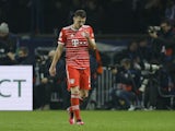 Bayern Munich's Benjamin Pavard walks off the pitch after receiving two yellow cards leading to a red card on February 14, 2023