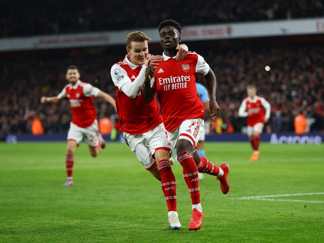 Bukayo Saka celebrates scoring for Arsenal against Manchester City on February 15, 2023