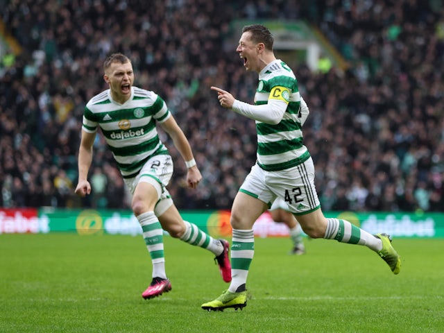 Celtic's Callum McGregor celebrates scoring their first goal with Alistair Johnston on February 18, 2023