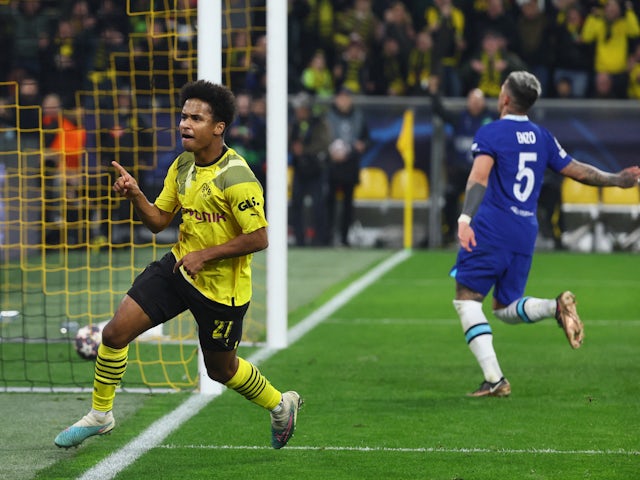 Borussia Dortmund's Karim Adeyemi celebrates scoring against Chelsea on February 15, 2023