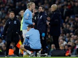 Manchester City's Erling Braut Haaland receives medical attention on February 12, 2023