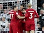 Liverpool's Cody Gakpo celebrates scoring their second goal with teammates on February 18, 2023