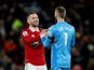 Manchester United's Luke Shaw celebrates with David de Gea after the match on February 4, 2023