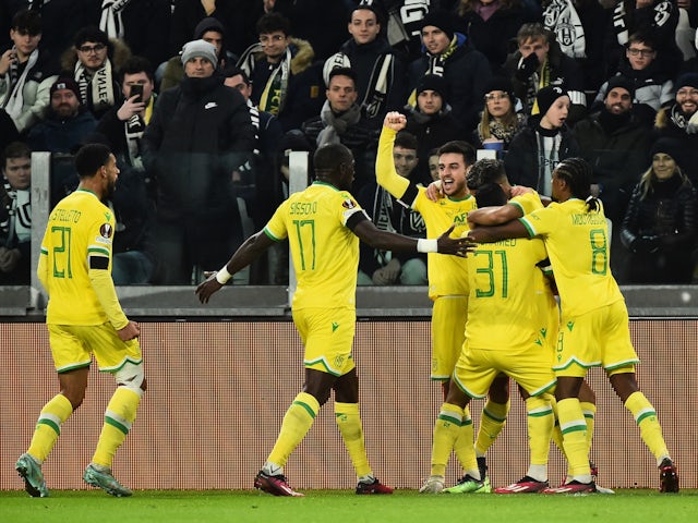 Nantes' Ludovic Blas celebrates scoring their first goal with teammates on February 16, 2023