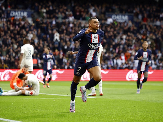Paris Saint-Germain's (PSG) Kylian Mbappe celebrates scoring their first goal on February 18, 2023