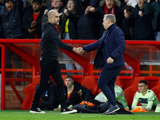 Manchester City manager Pep Guardiola shakes hands with Nottingham Forest manager Steve Cooper after the match on February 18, 2023