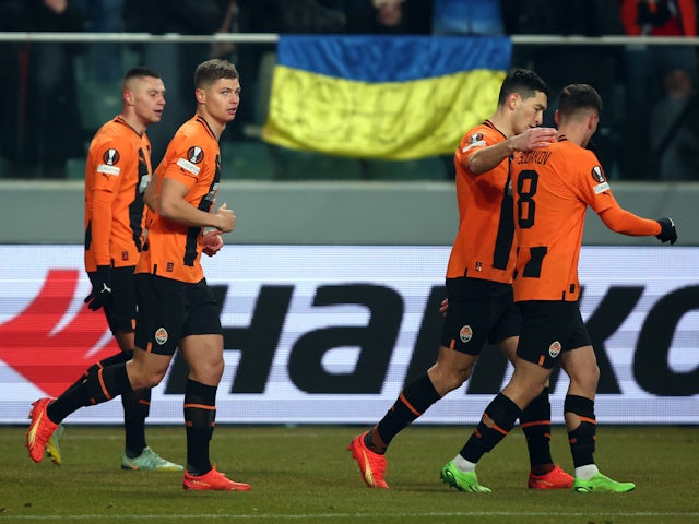 Shakhtar Donetsk's Heorhii Sudakov and teammates celebrate their first goal scored by Dmytro Kryskiv on February 16, 2023