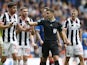 St Mirren's Declan Gallagher with teammates talk to referee Nick Walsh after he awards a penalty to Rangers on October 8, 2022