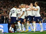 Tottenham Hotspur's Emerson Royal celebrates scoring their first goal with teammates on February 19, 2023
