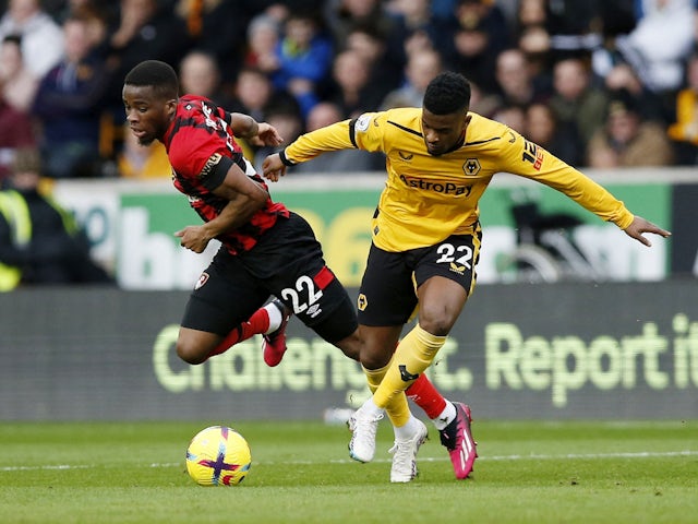 Bournemouth's Hamed Junior Traore in action with Wolverhampton Wanderers's Nelson Semedo on February 18, 2023
