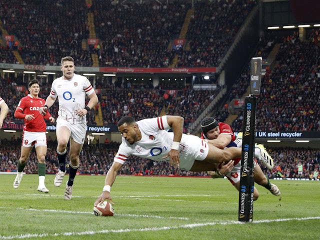England's Anthony Watson scores their first try against Wales on February 25, 2023