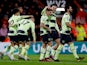 Manchester City players celebrate an own goal by Bournemouth's Chris Mepham on February 25, 2023